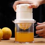.  Mini lemon and orange juicer with hand-press juicing cup